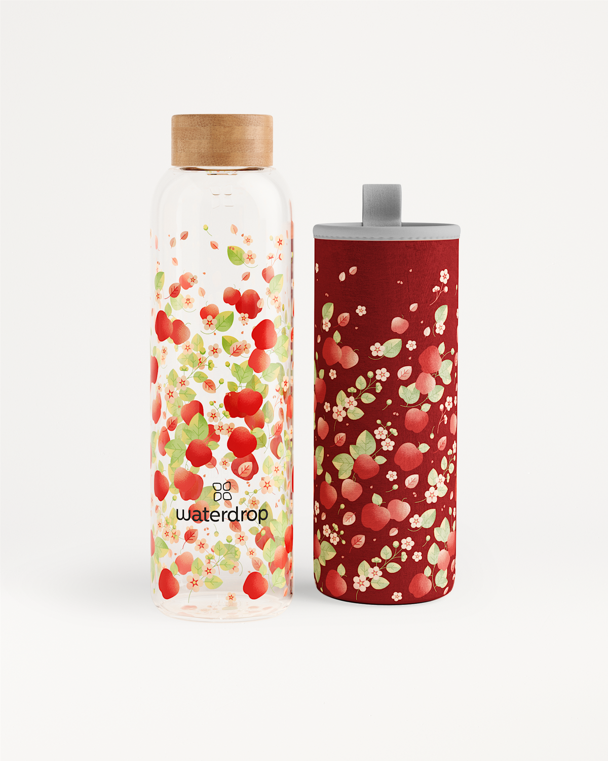APFEL Edition Glassflasche mit Fruchtmuster und rotem Neoprenüberzug.