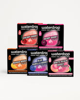 Zusammenstellung von Waterdrop Flavor-Boost-Dosen in zwei Reihen.